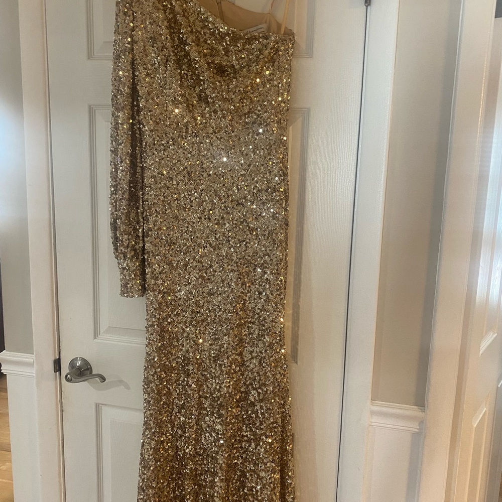 Gold, sequin gown with small train worn once for my son‘s wedding